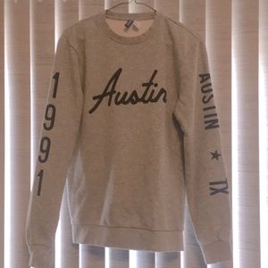 H&M grey sweater Austin TX and 1991 on the sleeves used $10